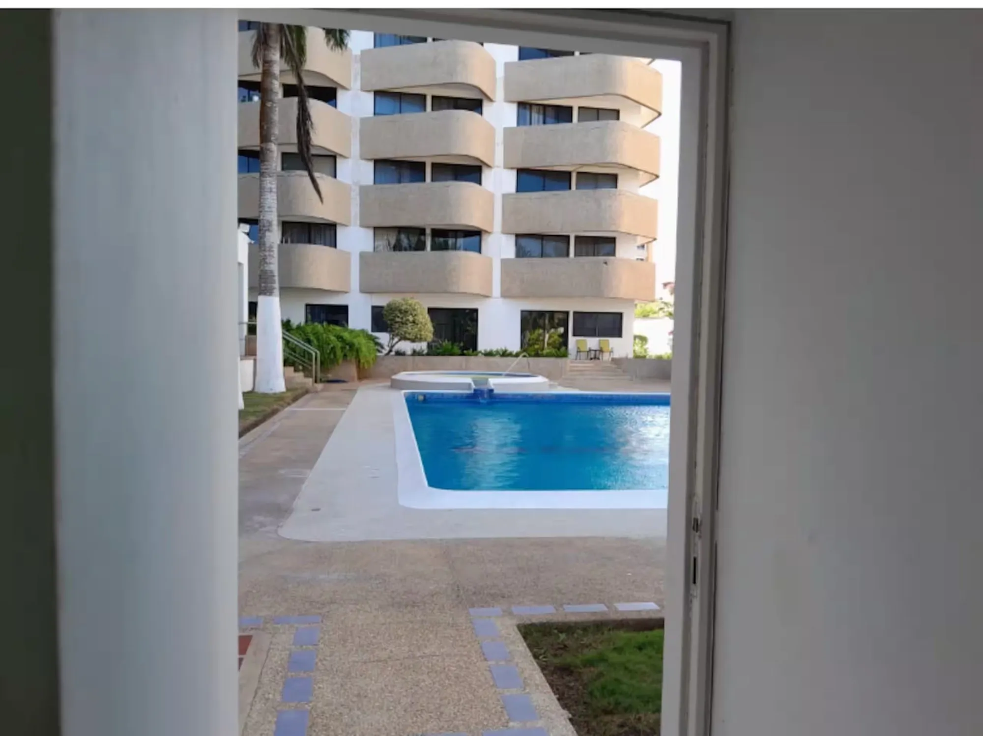 Vista piscina desde apartamento · Terraza Privada, Atenea Suites