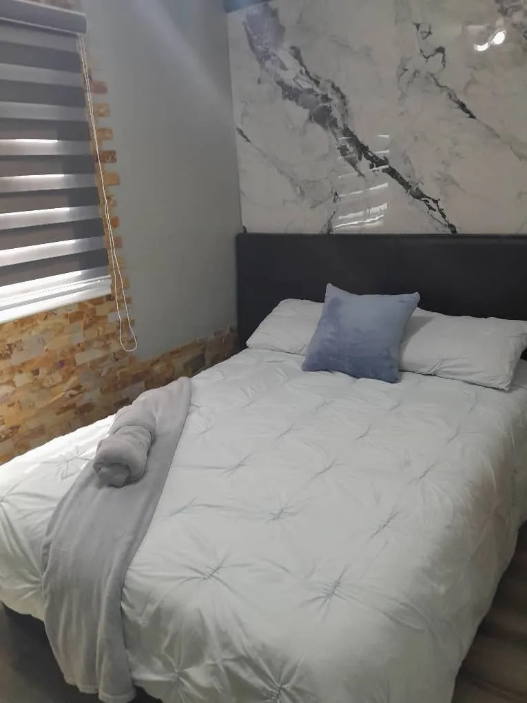 Habitación · Suite El Ángel, Residencias Los Cayos